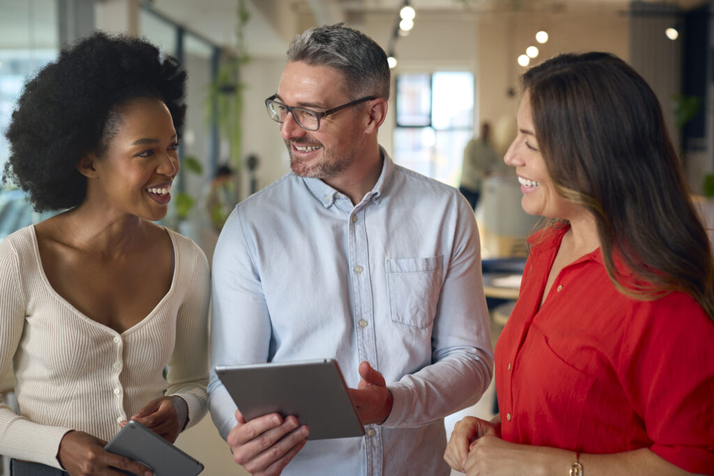 Business professionals talking about customer engagement.